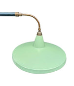 An Italian 1950s Stilnovo brass extendable telescopic wall light with green stitched leather arm