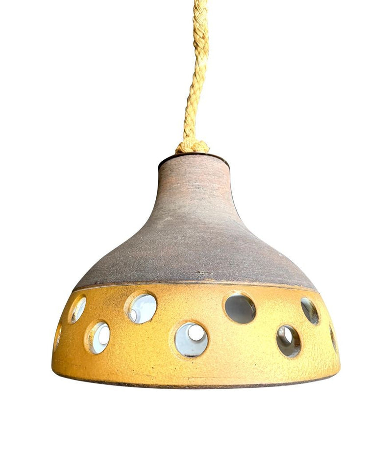 A set of three 1960s French glazed ceramic ceiling lights suspended from thick knotted rope