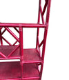 An Italian 1970s burgundy red bamboo shelving unit by Vivai del Sud