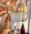 A pair of 1960s Orrefors heavy glass lamps with white glass core and nickel fittings