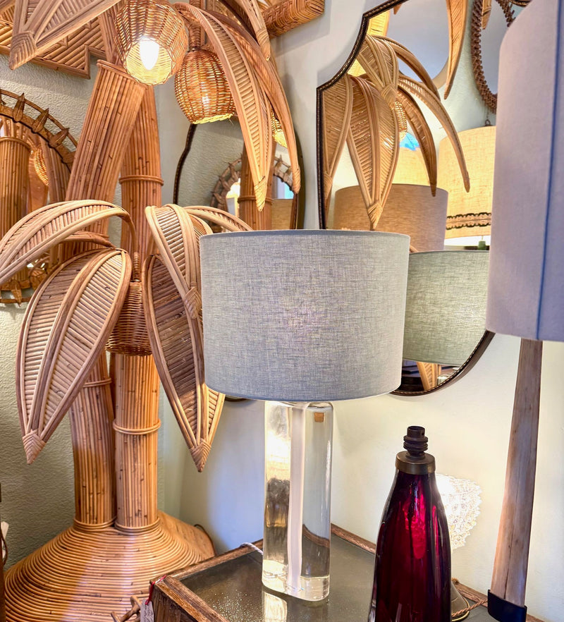 A pair of 1960s Orrefors heavy glass lamps with white glass core and nickel fittings