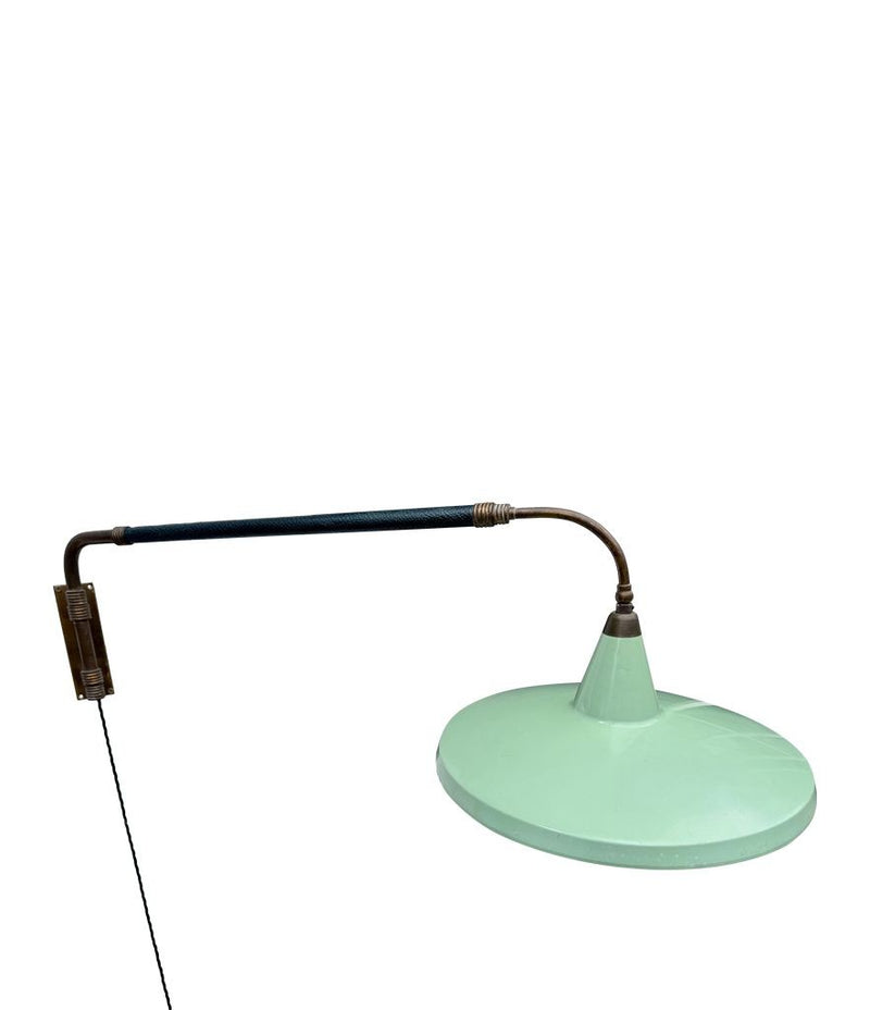An Italian 1950s Stilnovo brass extendable telescopic wall light with green stitched leather arm