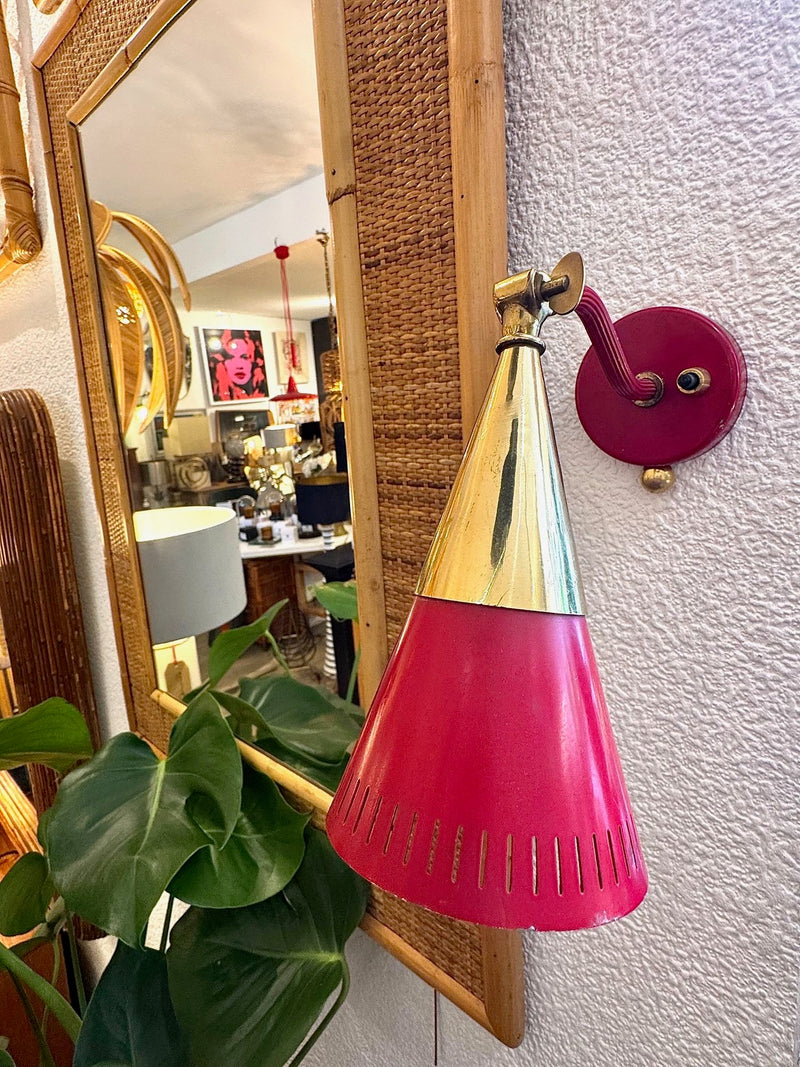 A pair of Holm Sorensen 1950s red enamelled metal and brass adjustable wall lights