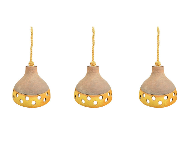 A set of three 1960s French glazed ceramic ceiling lights suspended from thick knotted rope