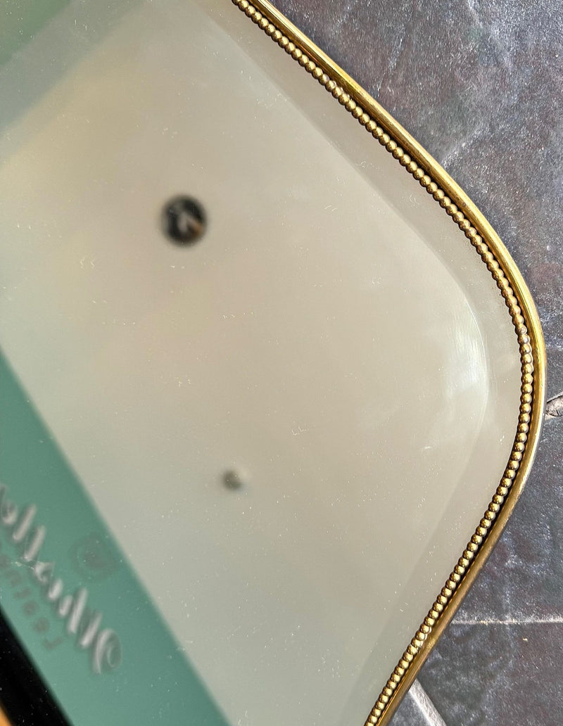 Mid Century mirror shield mirror with solid brass beaded frame 1950s