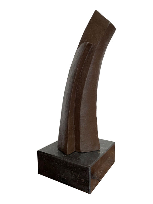 A Mid Century Belgian ceramic abstract sculpture with bronze textured style finish mounted on black marble base