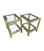 A pair of French 1970s gilt metal side tables by Pierre Vandel with original part mirrored glass shelves