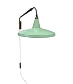 An Italian 1950s Stilnovo brass extendable telescopic wall light with green stitched leather arm