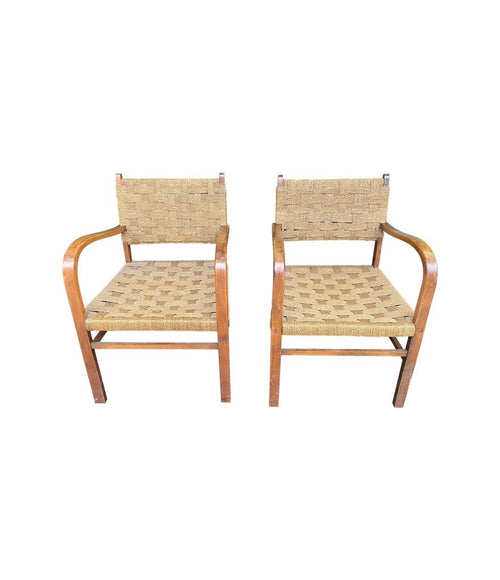 A pair of 1950s French bent wood chairs in the style of Erich Dieckmann with orignal woven rope seats