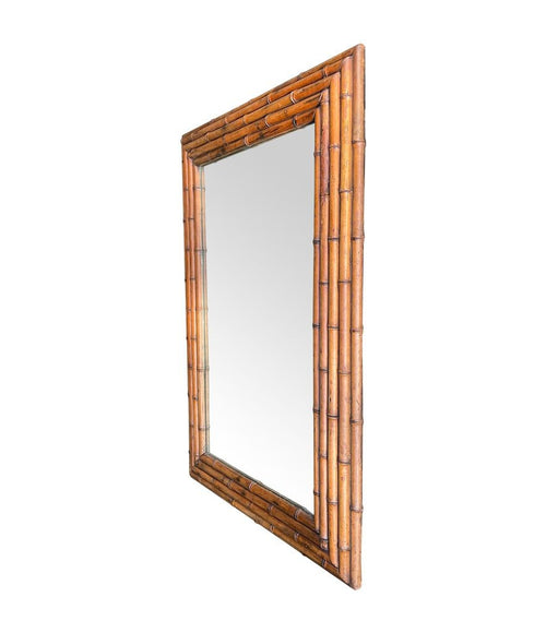 An Italian 1920s bamboo mirror with orignal plate