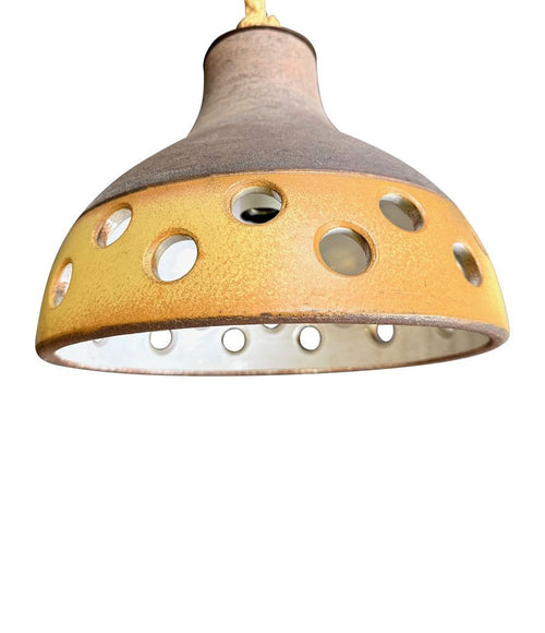 A set of three 1960s French glazed ceramic ceiling lights suspended from thick knotted rope