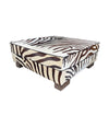 cowhide covered ottoman or coffee table with printed zebra skin design - Ed Butcher Antiques Shop London