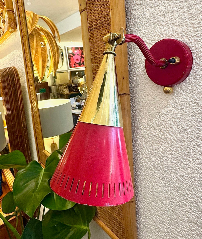 A pair of Holm Sorensen 1950s red enamelled metal and brass adjustable wall lights