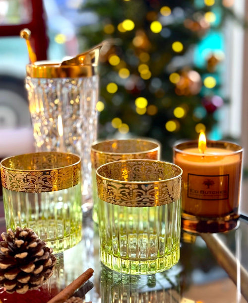 A set of six Italian Artemisia green crystal tumblers with 24 ct gold decoration