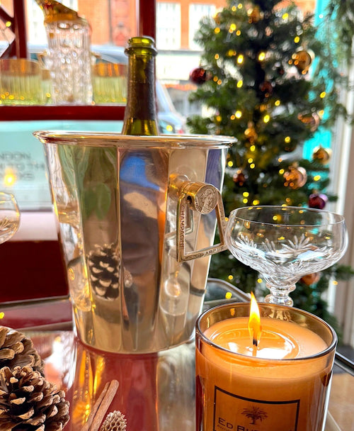 A French 1970s silver plated faceted Henri Abelé champagne bucket with decorative handles