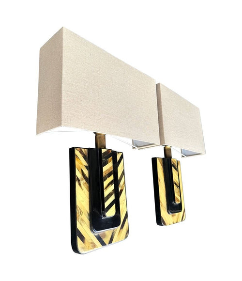 An unusual pair of 1970s Italian lacquered marquetry bone and brass wall sconces