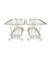 A pair of 1950s gilt wrought iron French side tables, with glass shelves