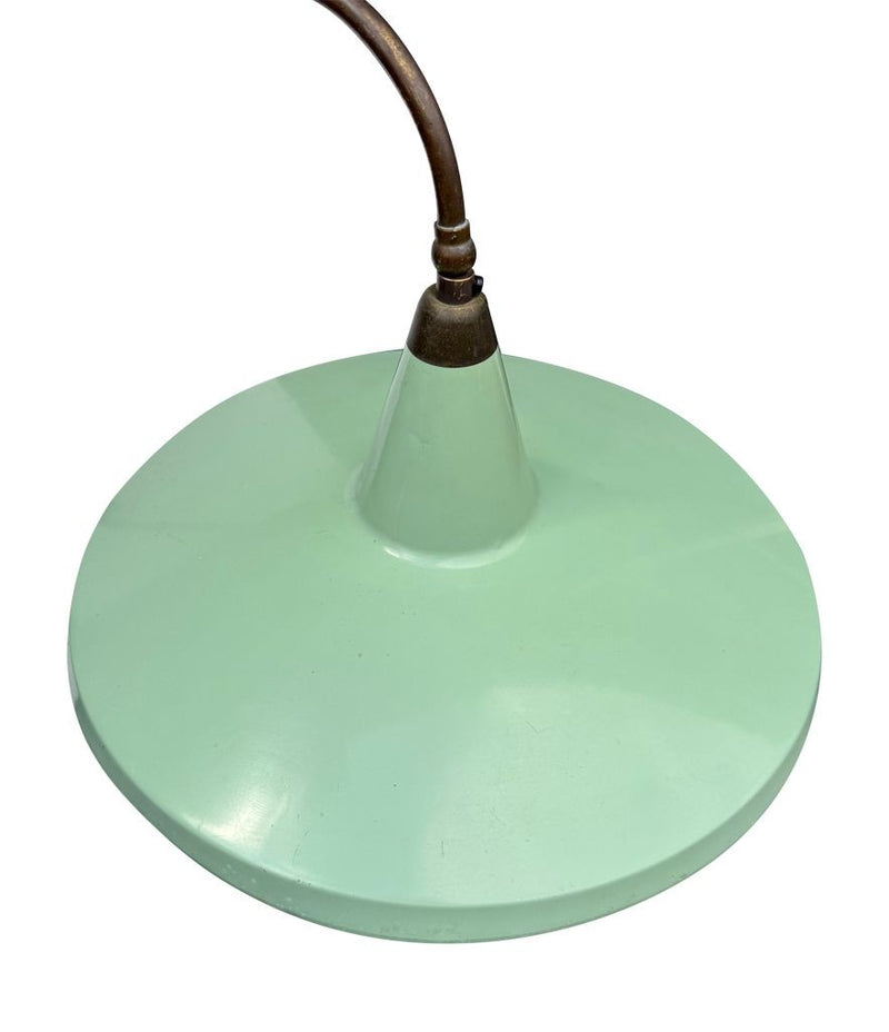 An Italian 1950s Stilnovo brass extendable telescopic wall light with green stitched leather arm