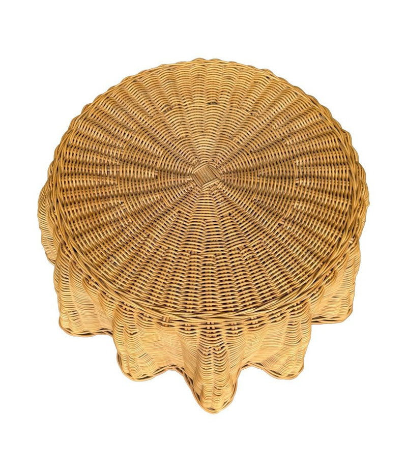 An Italian 1970s woven rattan "draped" side table with cost iron legs