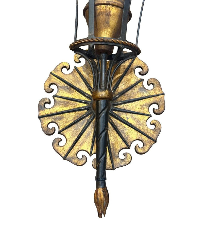 A large pair of Italian 1940s torchiere gilt and black metal wall sconces