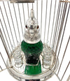A wonderful Victorian style green glass, cockatoo decanter in silver plated cage with 8 glasses