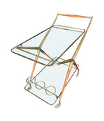 An Italian 1950s brass and lacquered wood bar trolley by Cesare Lacca