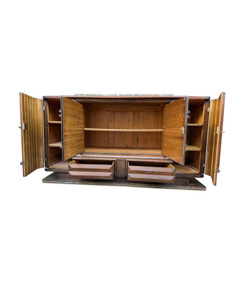 An Art Deco 1940s oak sideboard by Gaston Poisson with original marble top.