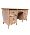 A 1980s colonial style carved wood and rattan desk by Roche Bobois