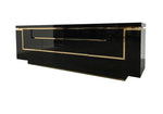 A 1970s vintage black piano lacquer sideboard by Jean Claude Mahey for Roche Bobois with brass detail