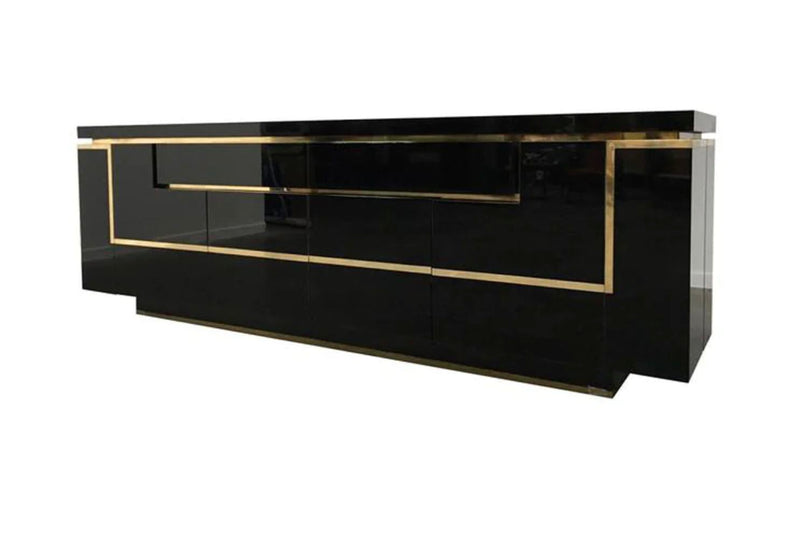 A 1970s vintage black piano lacquer sideboard by Jean Claude Mahey for Roche Bobois with brass detail