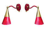 A pair of Holm Sorensen 1950s red enamelled metal and brass adjustable wall lights
