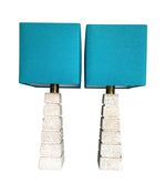 Mid Century table lamps with Travertine bases and brass fittings with blue linen shades - Mid Century Lighting