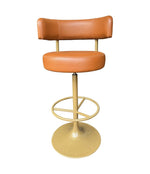 A set of four Börje Johanson “Jupiter” bar stools in cognac faux leather