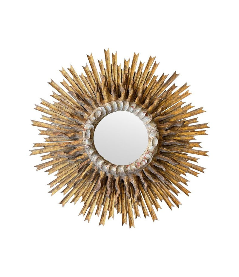A large 1940s French carved wood gilt sunburst mirror