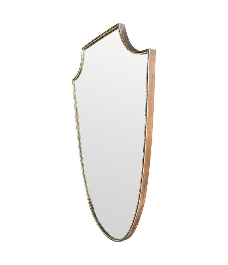 An orignal Italian 1960s brass shield mirror with beaded inner frame detail