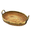 An Italian 1970s woven pencil reed bamboo and brass basket with two brass handles