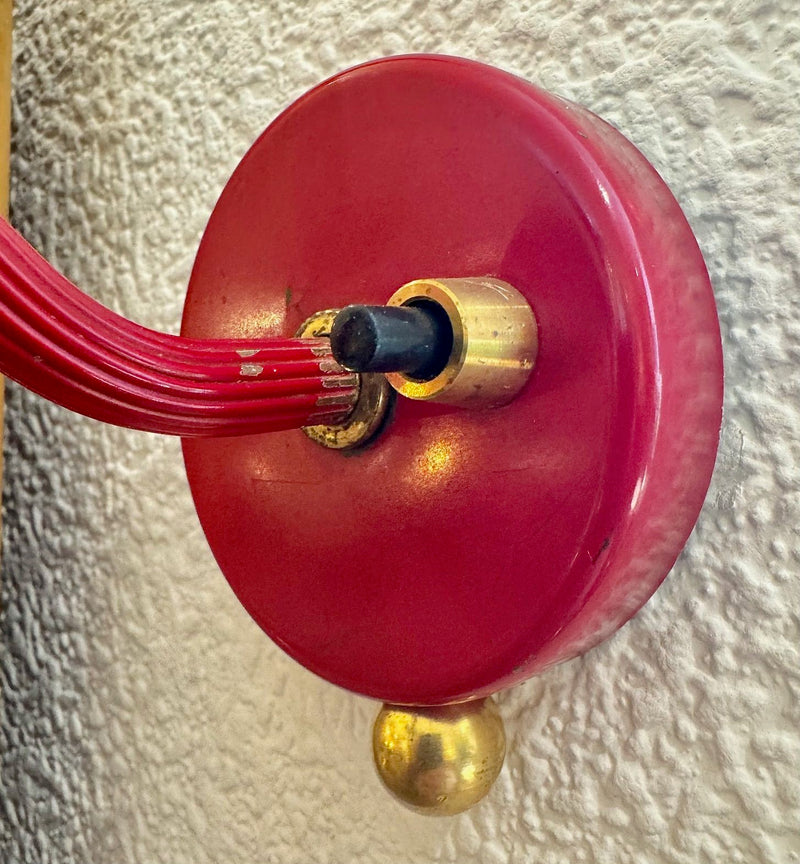 A pair of Holm Sorensen 1950s red enamelled metal and brass adjustable wall lights