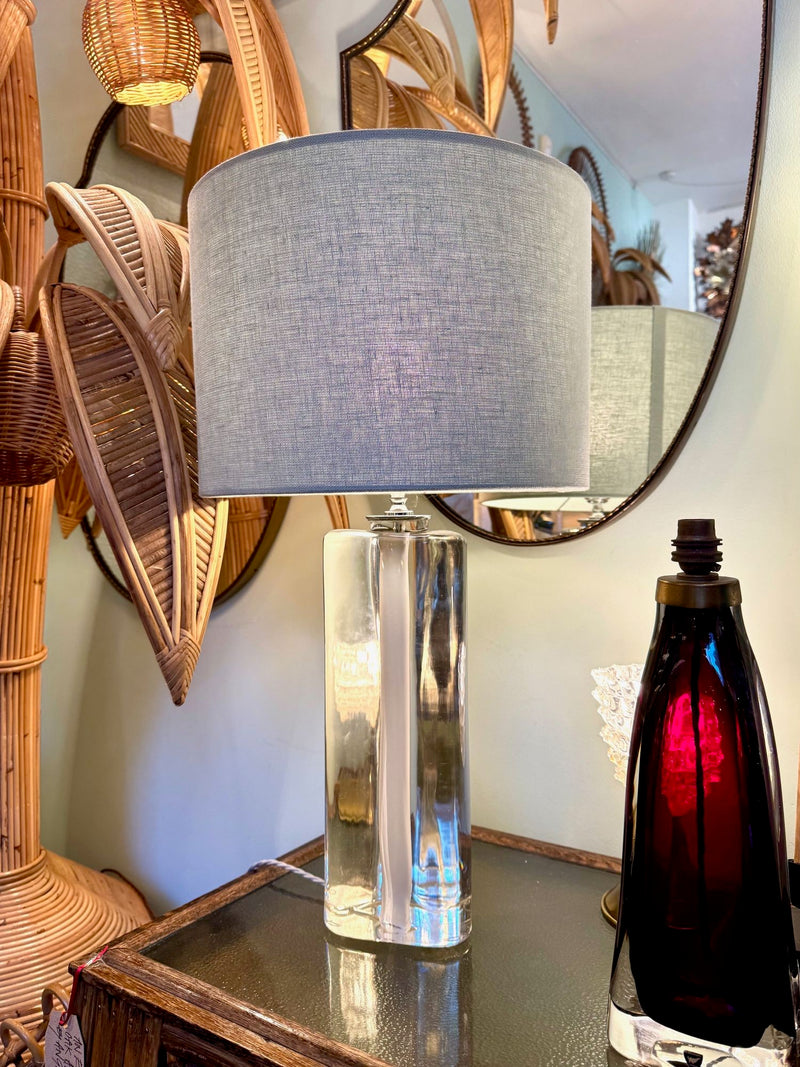 A pair of 1960s Orrefors heavy glass lamps with white glass core and nickel fittings