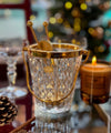 A 1960s Val Saint Lambert crystal and gold plated ice bucket with ice grabbers