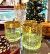 A set of six Italian Artemisia green crystal tumblers with 24 ct gold decoration