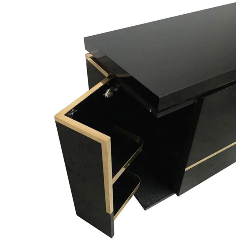 A 1970s vintage black piano lacquer sideboard by Jean Claude Mahey for Roche Bobois with brass detail