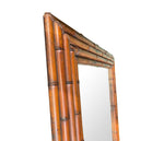 An Italian 1920s bamboo mirror with orignal plate