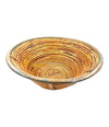 A large Italian 1970s woven bamboo bowl with brass rim