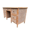 A 1980s colonial style carved wood and rattan desk by Roche Bobois