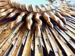 A large 1940s French carved wood gilt sunburst mirror