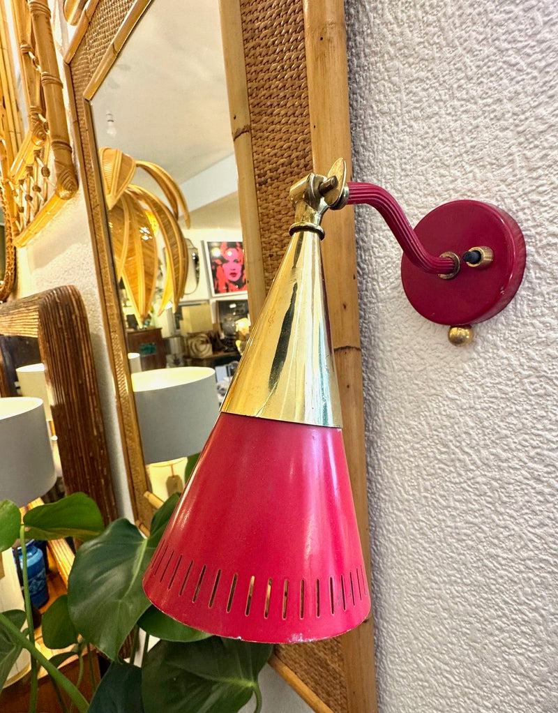A pair of Holm Sorensen 1950s red enamelled metal and brass adjustable wall lights