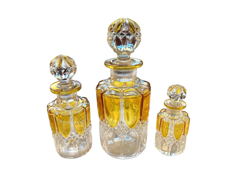 A. collection of seven Val Sat Lambert 1920s perfume bottles.
