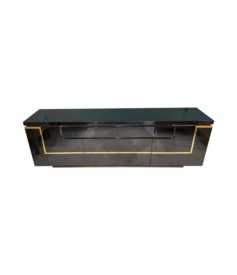 A 1970s vintage black piano lacquer sideboard by Jean Claude Mahey for Roche Bobois with brass detail