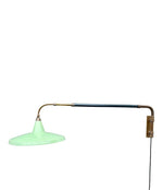 An Italian 1950s Stilnovo brass extendable telescopic wall light with green stitched leather arm