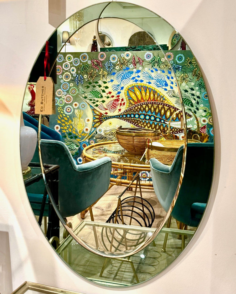 An Italian 1960s Crystal Arte oval mirror with pastel mint green mirrored frame